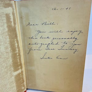May include: A handwritten note on a page of a book, dated 12-1-41, reads "Dear Bill: You will enjoy this book personally. autographed to you from Gene Sister Ann."