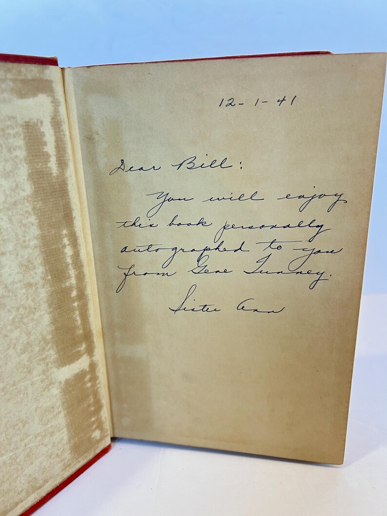 May include: A handwritten note on a page of a book, dated 12-1-41, reads "Dear Bill: You will enjoy this book personally. autographed to you from Gene Sister Ann."