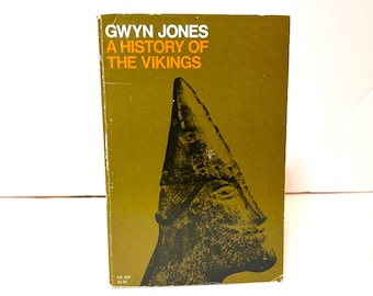 May include: A brown book with the title "Gwyn Jones A History of the Vikings" in white text. The cover features a black and white illustration of a Viking warrior wearing a horned helmet.