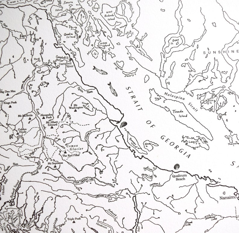 May include: A detailed black and white map depicting the Strait of Georgia and surrounding areas, including islands, rivers, and mountain peaks. Features place names like Qualicum Beach and Nanaimo.