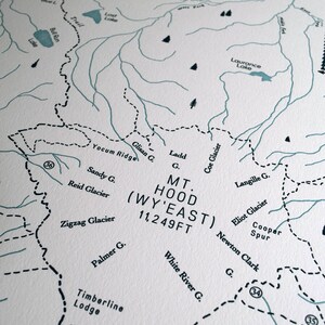 May include: Detailed map print of Mt. Hood (Wy'East) in Oregon, featuring contour lines, rivers, lakes, and place names like Zigzag Glacier and Timberline Lodge. The elevation is marked as 11,249 feet.