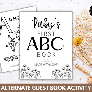 May include: Black and white printable baby's first ABC book guest book activity. The cover features the text "Baby's First ABC Book" and a floral design. The inside page features the letter A and a drawing of an apple with the text "A is for apple".