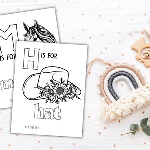 May include: Black and white printable coloring page featuring the letter H and the word "hat". The letter H is decorated with a cowboy hat with sunflowers. The text "H is for hat" is below the image.