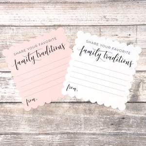 May include: Two pink and white cards with scalloped edges. The cards have the text "Share your favorite family traditions" and a line for writing. The cards also have the word "from." printed on them.