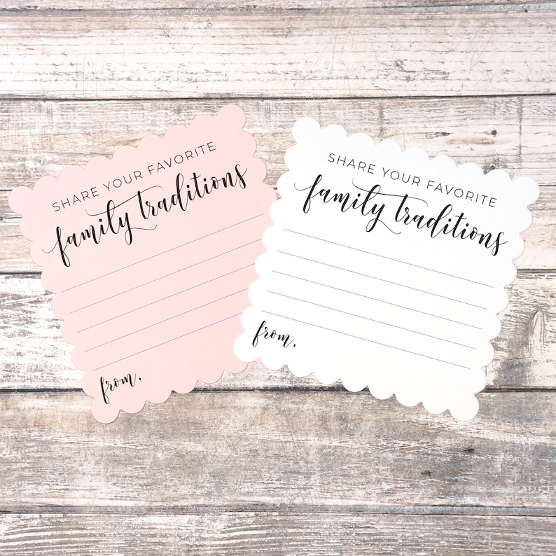 May include: Two pink and white cards with scalloped edges. The cards have the text "Share your favorite family traditions" and a line for writing. The cards also have the word "from." printed on them.
