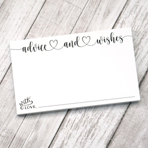 May include: A white rectangular card with the words "advice and wishes" in black script, with a heart symbol between the words. The phrase "with love" is printed in a script font at the bottom left.