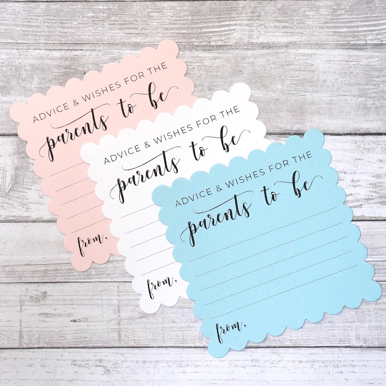 May include: Two baby shower advice cards with scalloped edges. The cards are pink, white, and blue. The text on the cards reads "Advice & Wishes for the parents to be" and "from."