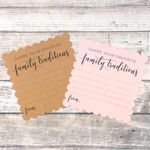 May include: Two cards with scalloped edges, one brown and one pink, with the text "SHARE YOUR FAVORITE family traditions" and a line for writing.  The cards are on a woodgrain background.