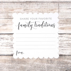 May include: White card with scalloped edges and the text "Share your favorite family traditions" printed in black. There is a blank space below the text for writing and the word "from." printed at the bottom.