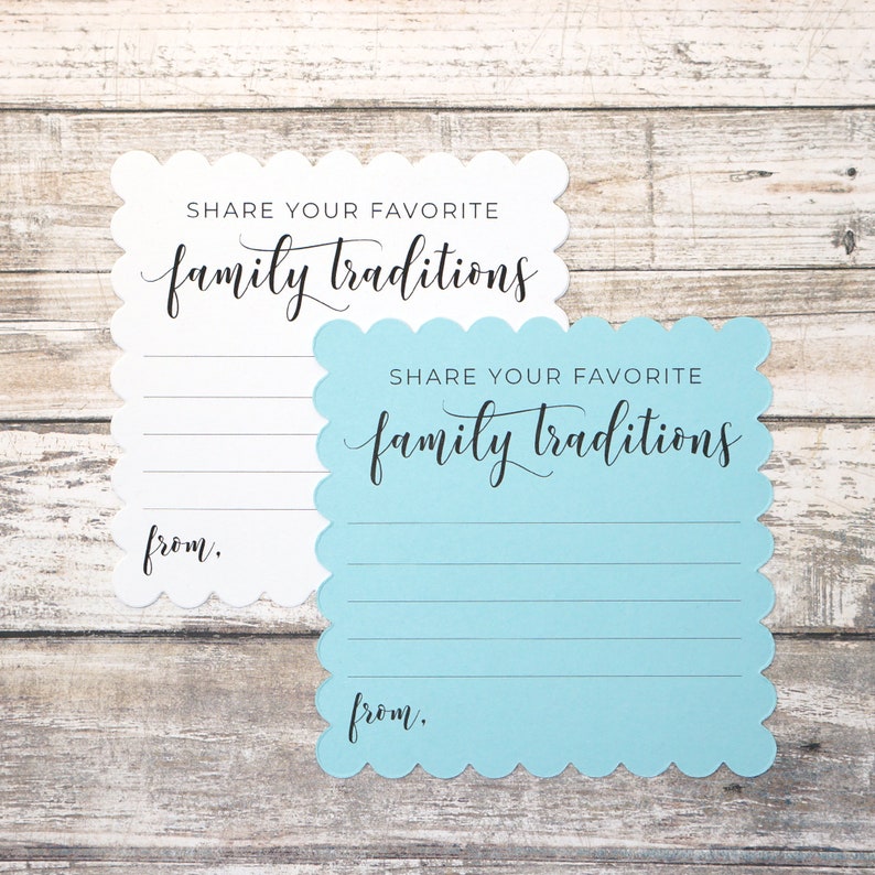 May include: Two white and blue cards with scalloped edges. The cards have the text "Share your favorite family traditions" and a line for writing "from."