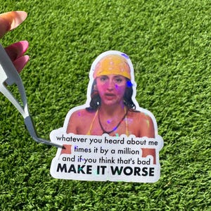 May include: A sticker featuring a woman wearing a yellow bandana and bikini top. The sticker has text that reads "whatever you heard about me times it by a million and if you think that's bad MAKE IT WORSE."