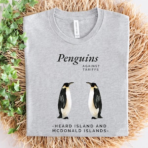 Penguins Against Tariffs Shirt: Funny Anti-Trump Unisex Tee