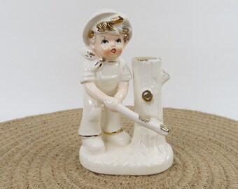 Vintage Porcelain Boy with Ax Figurine
