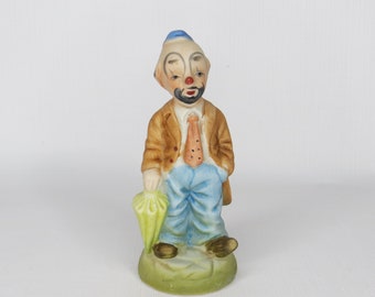 Vintage Porcelain Clown with Umbrella Figurine