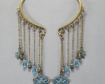 Pendientes tipo puño de cangrejo de latón con pátina azul, sin perforaciones, con el signo del zodiaco Cáncer, par o individual