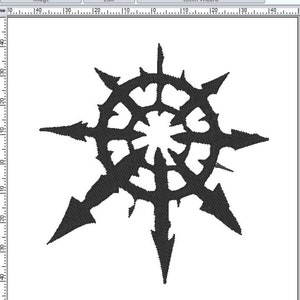 May include: A black and white embroidered design of a starburst with a circle in the centre. The design is on a white background.