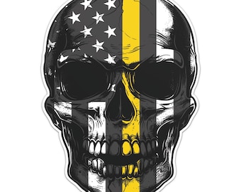 May include: A black and white skull with a yellow stripe down the centre. The skull is decorated with an American flag pattern.