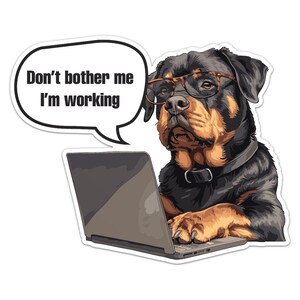 May include: A Rottweiler dog wearing glasses and sitting at a laptop computer with a speech bubble above its head that says "Don't bother me I'm working".