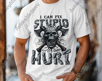May include: White t-shirt featuring a skull graphic with crossed axes and the text "I CAN FIX STUPID BUT IT'S GONNA HURT" in a distressed, gray font. The design has a grunge aesthetic.