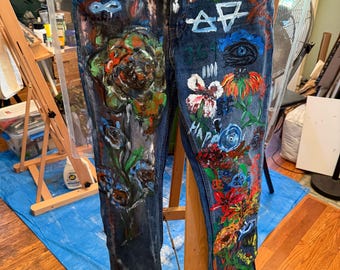 Painted blue Jeans that is wearable art