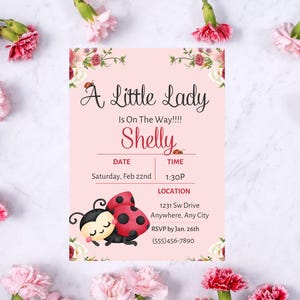 May include: A pink baby shower invitation with the text "A Little Lady Is On The Way!!!! Shelly." The invitation includes a cartoon ladybug and floral accents. The date is Saturday, Feb 22nd, and the time is 1:30P.