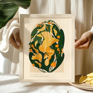 Könnte beinhalten: Eine gerahmte Illustration von gelben Kartoffelchips mit grünen Blättern und dem Text "Hot & Crispy Botanical Potato Chips".