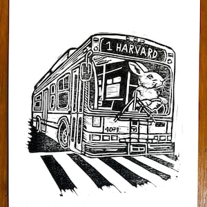 Rabbit driving MBTA bus toward Harvard, Cambridge, Massachusetts, linocut, lino print