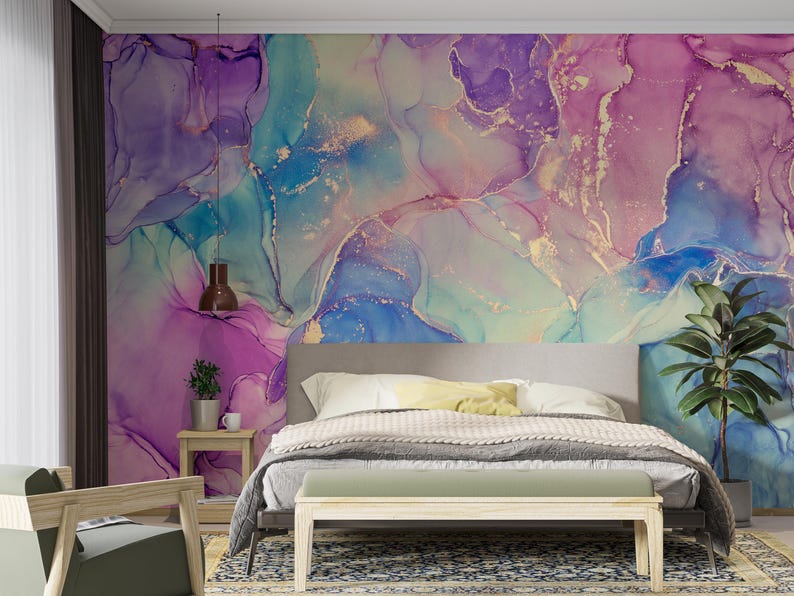 May include: A bedroom featuring a bed and a bedside table. The wall behind the bed is adorned with a large abstract painting in shades of purple, blue, and gold.