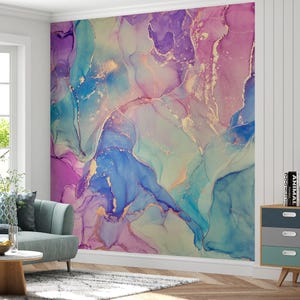 May include: Abstract wall mural featuring a swirling pattern in shades of blue, purple, and green with gold accents. The mural is shown on a wall in a living room setting.