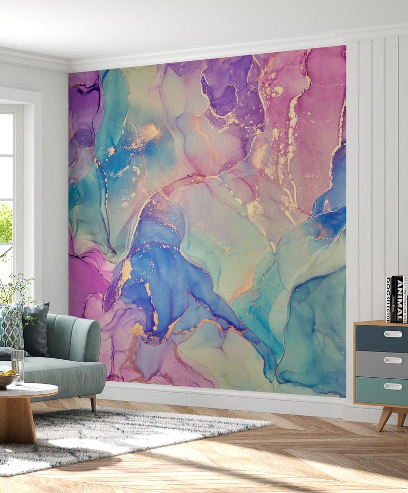 May include: Abstract wall mural featuring a swirling pattern in shades of blue, purple, and green with gold accents. The mural is shown on a wall in a living room setting.