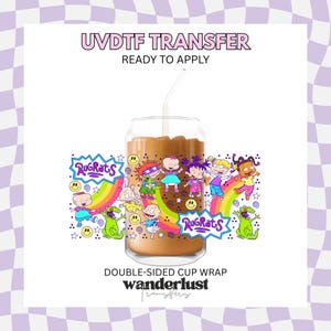 May include: A UV DTF transfer ready to apply, featuring a double-sided cup wrap design with colorful Rugrats characters, rainbows, and smiley faces. The graphic is displayed on a clear glass can filled with a brown beverage and a clear straw.