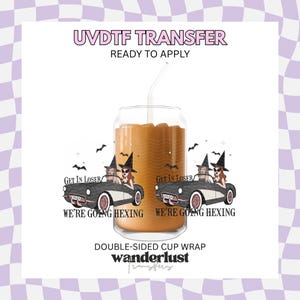 May include: A UVDTF transfer double-sided cup wrap featuring a graphic of two figures in witch hats driving a black and white vintage car. The text reads GET IN LOSER WE'RE GOING HEXING. The design includes bats and stars on a clear glass cup.