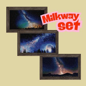 May include: A set of three framed art prints featuring vibrant depictions of the Milky Way galaxy. Each print showcases a different celestial scene with dark blue, orange, and white hues, set against a backdrop of silhouetted trees and mountains. The text "Milkyway set" is displayed.