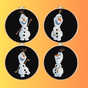 May include: Four cross-stitch embroidery hoops featuring the character Olaf from the film Frozen. Each hoop has a black background and a wooden frame. Olaf is white with a carrot nose, twig arms, and a few strands of hair.