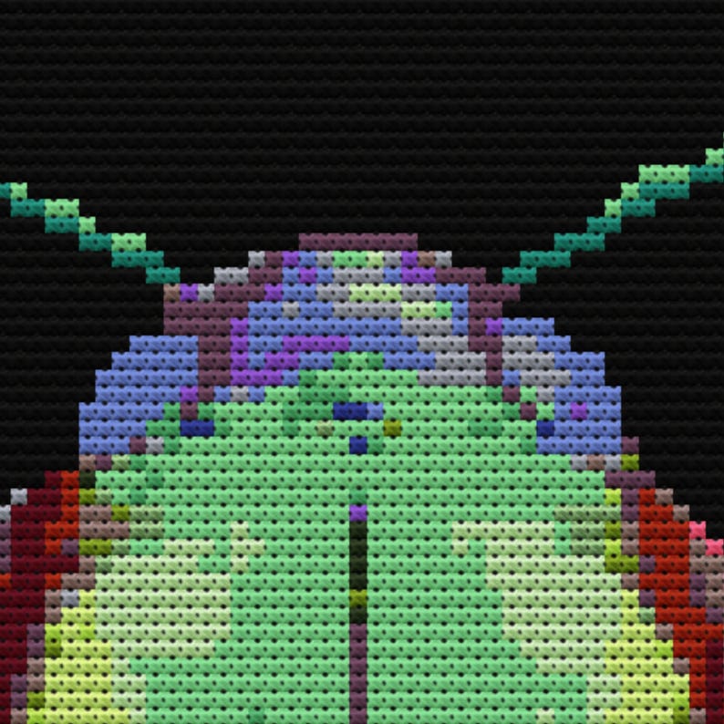 May include: A close-up of a green, blue, and purple pixelated design. The design is reminiscent of a flower or a butterfly.