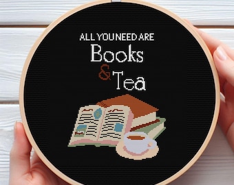 May include: Black embroidery hoop with the text "All you need are Books & Tea" in white. A stack of books and a cup of tea are depicted in the center.