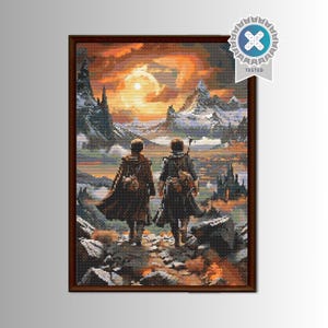 May include: Cross-stitch artwork depicting two figures walking towards a sunset over a mountain range. The scene is framed in a dark brown wooden frame. The sky is a mix of orange and yellow hues, with a large sun. The artwork has a "TESTED" seal.