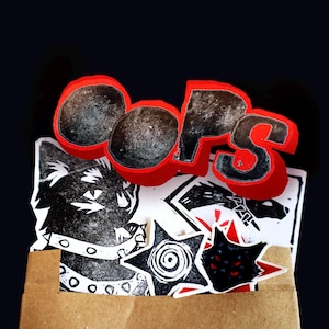 OOPS mystery sticker bag