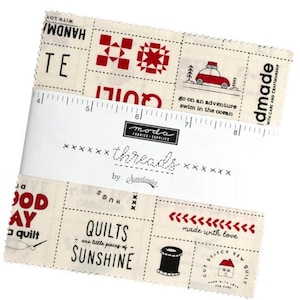 May include: A pack of 42 fat quarter fabric squares featuring a variety of quilting designs and sayings. The fabric is a cream color with red, black, and white accents. The fabric squares feature sayings like "Handmade with Love", "Quilts are little pieces of sunshine", and "Go on an adventure, swim in the ocean".