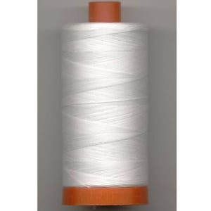 May include: A spool of white thread with an orange plastic bobbin.
