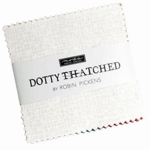 May include: A stack of white fabric squares with a subtle grid pattern, wrapped with a white band. The band features the text "DOTTY THATCHED" and "BY ROBIN PICKENS" in black. The fabric is from Moda Fabrics.