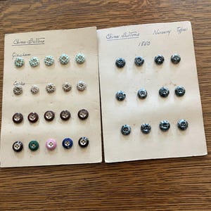 Vintage Set of 32 China Nursery Type Buttons on 2 Display Cards