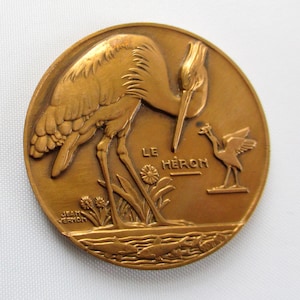 Vintage Le Heron Medallion Jean Vernon