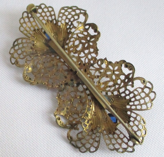 Vintage Filigree Brooch White and Blue Stones - image 10