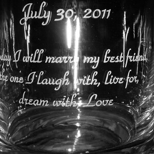 May include: A clear glass jar with the text "July 30, 2011" etched on the top. The text "Today I will marry my best friend, the one I laugh with, live for, dream with Love" is etched on the side of the jar.
