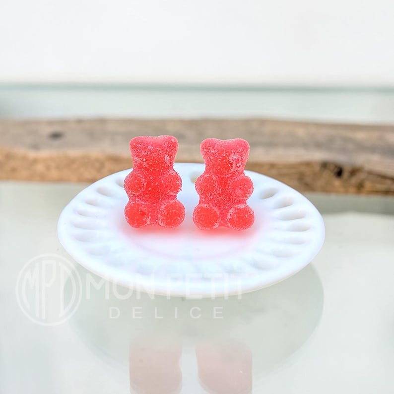 Red sugar gummy bear stud earrings handmade in resin, close-up view