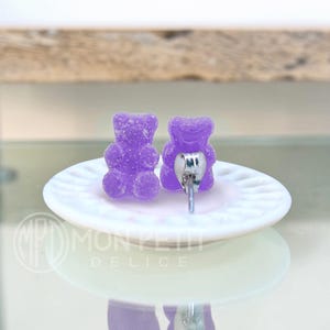 Back view of handmade purple sugar gummy bears stud earrings with stainless steel