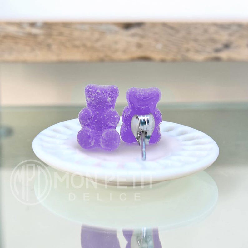Back view of handmade purple sugar gummy bears stud earrings with stainless steel