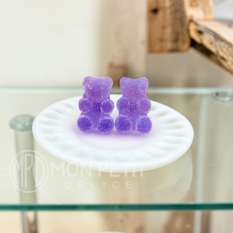 Purple sugar gummy bear stud earrings handmade in resin, close-up view