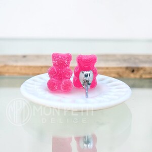 Back view of handmade red pink sugar gummy bears stud earrings with stainless steel